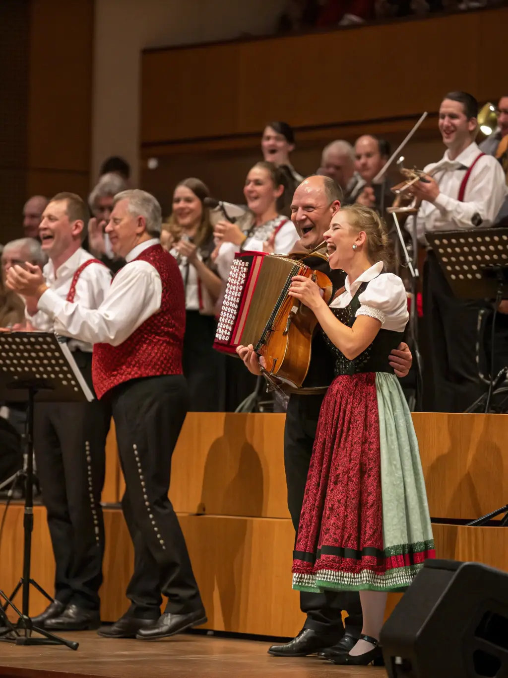 A musical performance featuring local musicians playing traditional instruments in a village square, drawing a large crowd of community members.